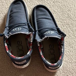 Mens hey dude shoes. Baby with red, white and black inside lining.